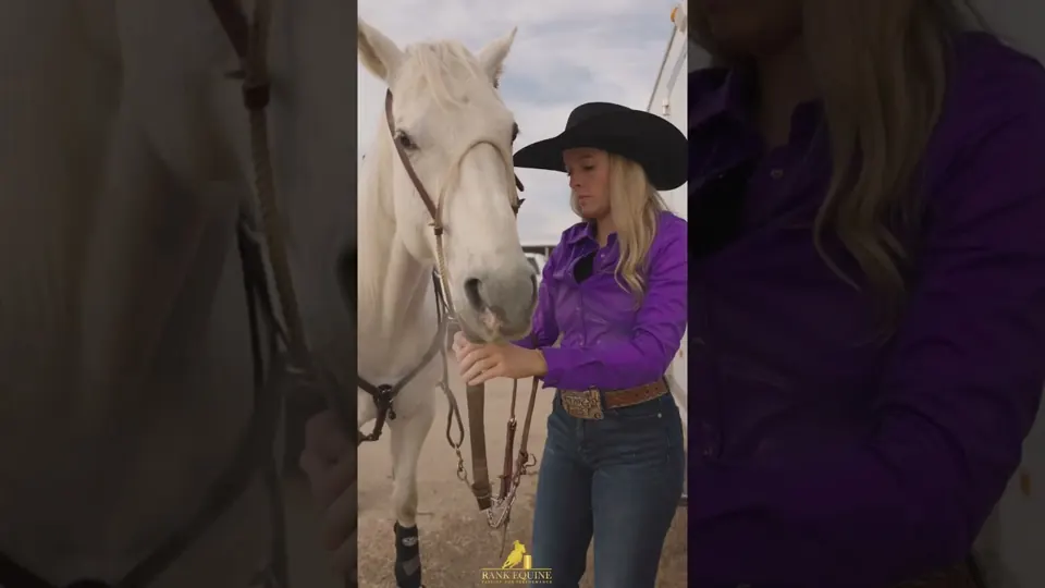 Lexi Rankin with a gray barrel horse